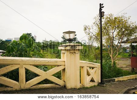 Street lights at the end of the bridge photo taken in Semarang Indonesia java