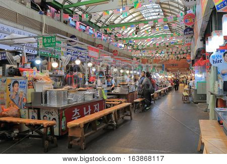 SEOUL SOUTH KOREA - OCTOBER 21, 2016: Unidentified people visit Gwangjang market. Gwangjang market is one of the oldest and largest traditional markets in South Korea with more than 5000 shops.