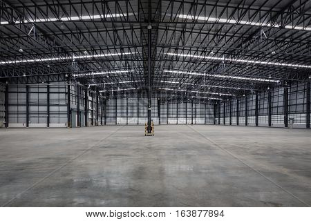 Construction of empty modern warehouse for distribution goods.
