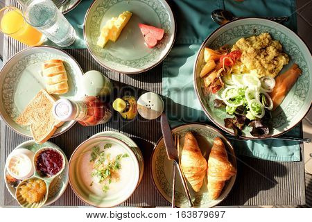 Happy Family Having Breakfast on the tabke
