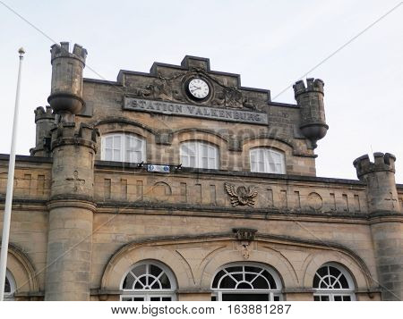 Clock and turrets on Valkenburg Railway Station in Holland