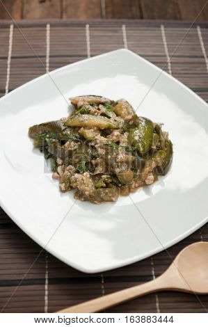 Stir-fried eggplant and Minced pork on wood