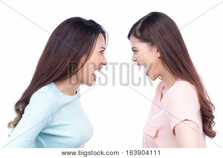 Two asian women shouting each other against white background.