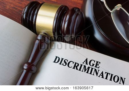 Book with chapter age discrimination and a gavel.