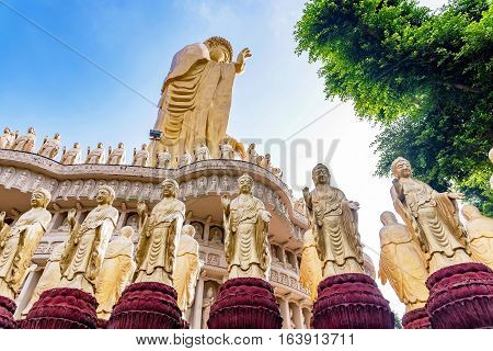 Buddha statues with large gold buddha and nature