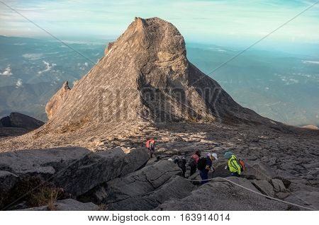 Ranau,Sabah-April 30,2014:Climber move down from Low's Peak to Sayat-Sayat check point of mount Kinabalu,Sabah.Its the highest mountain in Malaysia is one of Borneo's most popular climbers attraction