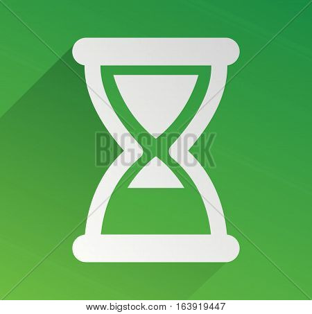 green hourglass with long shadow. green background