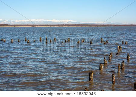 Paliastomi Lake On The Background Of The Caucasus Mountains
