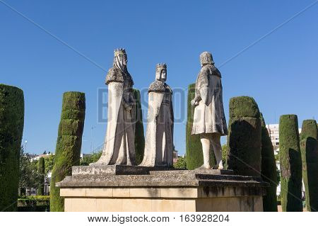 Old Stone Statues of the Christian Kings with Cristobal Colon in the gardens of the Alcazar in Cordoba Spain
