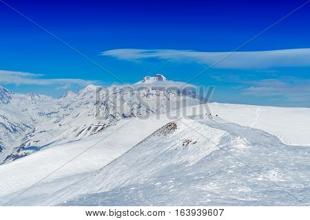 Winter in Greater Caucasus Mountains. Georgia (country). Gudauri ski resort. View from Mt. Sadzele.