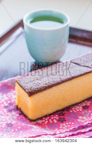 Castella - Traditional Japanese Sponge Cake And Hot Tea.