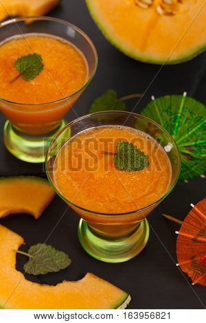 Homemade Cantaloupe Melon Smoothie Drink. Selective focus.