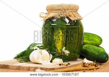 Dill Pickled Cucumbers Isolated on white background. Selective focus.