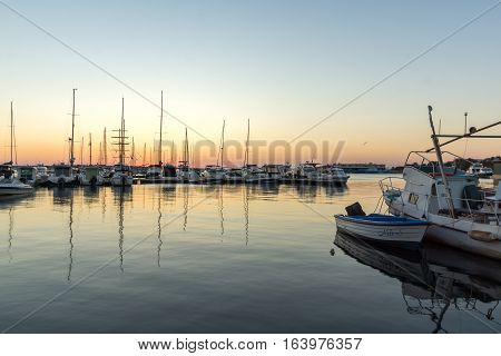 Sozopol, Bulgaria - July 11, 2016: Sunset at the port of Sozopol, Burgas Region, Bulgaria