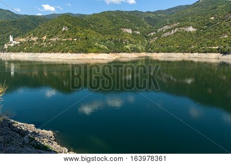 Green forest around Vacha (Antonivanovtsy) Reservoir, Rhodopes Mountain, Bulgaria
