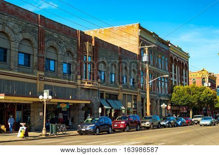 PORT TOWNSEND WA - SEPTEMBER 15 2016: Old buildings along Water Street in this historic town on Washington's Olympic Peninsula retain a vintage appeal.