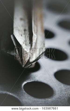 Drill reamer at factory workshop. Selective focus