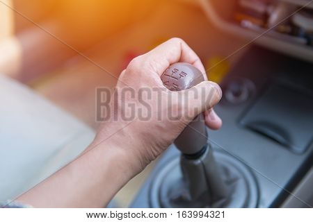 Hands Of A Driver Shifting The Gear On Car Manual Gearbox