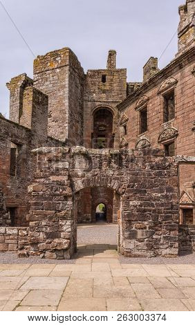 Shearington, Scotland, Uk - June 18, 2012: Inner Courtyard Of Ruined  Brown Stone Early Classical Do