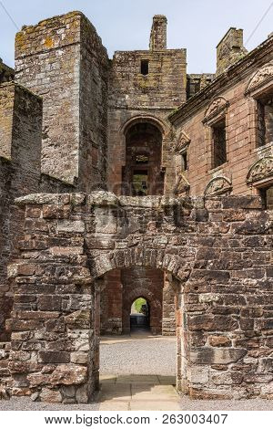 Shearington, Scotland, Uk - June 18, 2012: Inner Courtyard View To Entrance Of Ruined  Brown Stone E