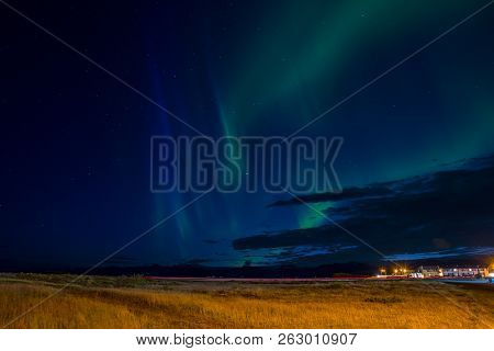 Norhtern Lights Above Port Of Hornafjordur In Iceland