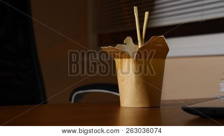 A Businessmans Table With Fast Food. Late Dinner At The Office. Copy Space