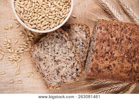 Multi-grain Bread On A Wooden Background. Healthy Food Concept.