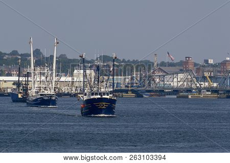 Commercial Fishing Vessel Luzitano And Other Boats Leaving Port