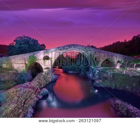 Cangas de Onis roman bridge on Sella river in Asturias of Spain