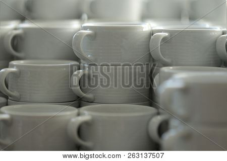 Group Of Empty White Ceramic Cups For Coffee Or Tea In A Hotel.the Concept Of Nutrition, Health, Cle