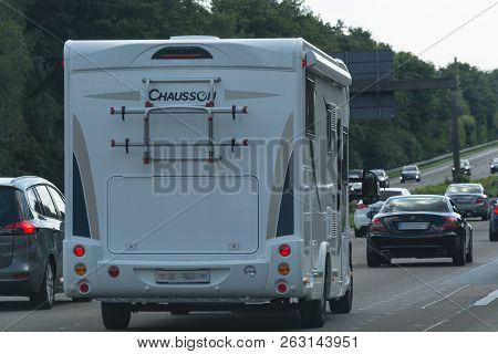 Grafschaft; Germany - August 13; 2017:
Motorhome On The A 61 Motorway In Tourist Traffic Near The Ci