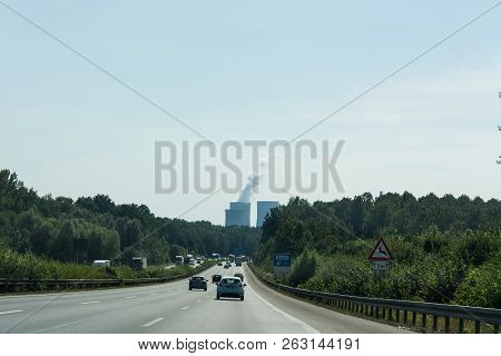 Unna, Germany - August 23, 2017: Traffic On The A2 Motorway And Scholven Coal Power Station, Germany