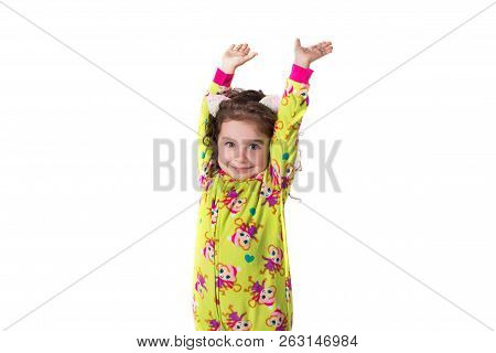 Little Girl In Pajamas On White Background