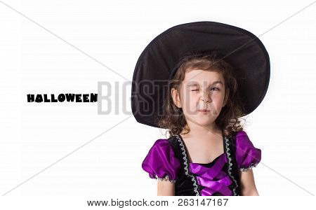 Little Girl Witch In Black Hat. Isolated.