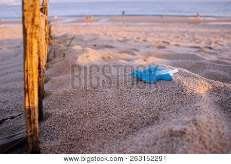 Blue Wooden Turtle On The Beach. 