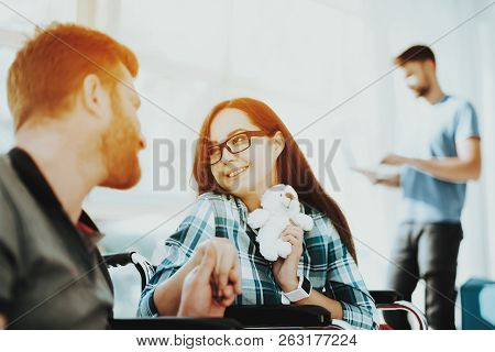 People In Wheelchair. Disabled In Hall. Woman In Wheelchair. Room Panoramic View. Smiling Woman Disa