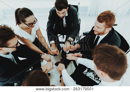 Collective Work. Group Disabled Worker. Workers With Disabilities. Business Meeting. Business Suits.