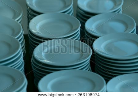 Cropped Shot Of  Dishes. Purity, Order, Cleaning Concept. White Plates Close Up.