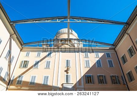 Castelgandolfo, Italy - April 21, 2017: The Dome Of The Astronomical Observatory Seen From The Court