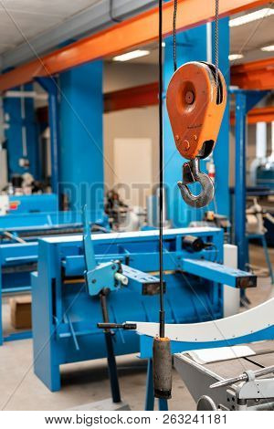 Crane Hook. The System Of Pulleys And Ropes, A Hanging Mechanism In The Production Area. Movement Re