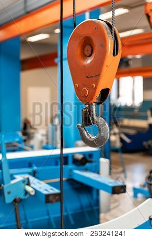 Crane Hook. The System Of Pulleys And Ropes, A Hanging Mechanism In The Production Area. Movement Re