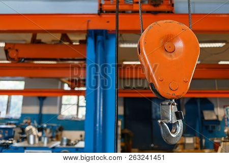 Crane Hook. The System Of Pulleys And Ropes, A Hanging Mechanism In The Production Area. Movement Re