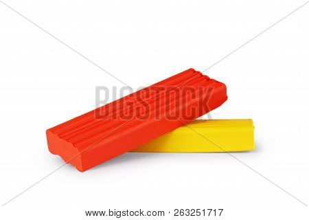 Pile Of Colored Plasticine Bricks On A White Background