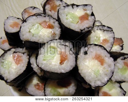 Sushi Rolls Homemade. Plate Lined With Rolls According To Japanese Recipes.