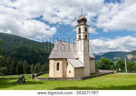 The Church Of The Village Of Santa Fosca In The Italian Dolomites