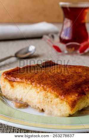 Balkan Dessert Cake Trilece With Caramel Sauce And Tea.