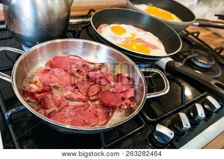 Turkish Style Bacon Pastirma / Pastrami In Pan With Fried Egg