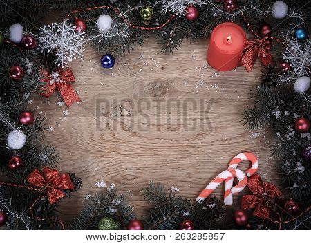 Christmas Wreath With A Congratulatory Inscription On A Wooden
