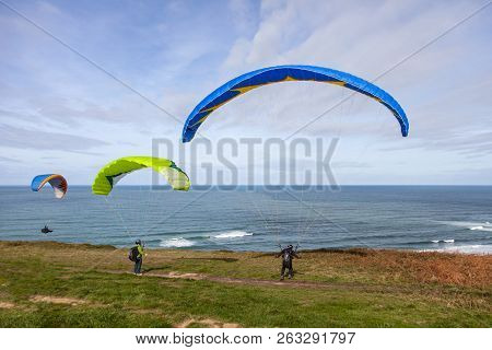 Paragliding Flight At The Edge Of The Coast