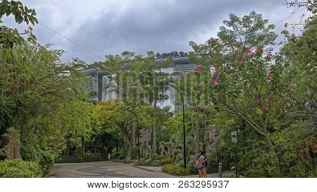 Singapore, Singapore- August 08, 2018: Gardens By The Bay. Visitors Walk In The Park